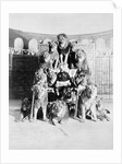 Animal Trainer Posing with Lions by Anonymous