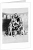 Animal Trainer Posing with Lions by Anonymous