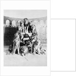 Animal Trainer Posing with Lions by Anonymous