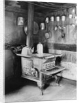 Old Stove Inside Log Cabin Kitchen by Anonymous