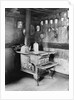 Old Stove Inside Log Cabin Kitchen by Anonymous