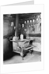 Old Stove Inside Log Cabin Kitchen by Anonymous