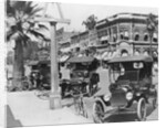 Cars Parked Alongside Street by Anonymous