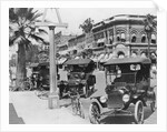 Cars Parked Alongside Street by Anonymous