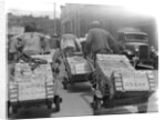 Chinese Men Pulling Heavy Loads of Silver Bullion by Anonymous