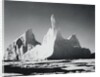 Iceberg Rising From Arctic Waters by Anonymous