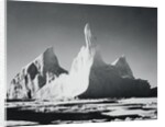Iceberg Rising From Arctic Waters by Anonymous