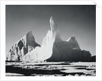 Iceberg Rising From Arctic Waters by Anonymous