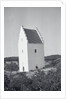 Couple Relaxing in Window of Large Sand Engulfed Church by Anonymous