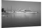 Onassis Yacht Docked on Shore by Anonymous
