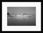 Onassis Yacht Docked on Shore by Anonymous