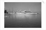 Onassis Yacht Docked on Shore by Anonymous