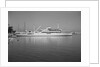 Onassis Yacht Docked on Shore by Anonymous