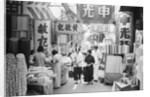 People Shopping in Market by Anonymous