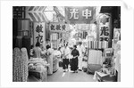 People Shopping in Market by Anonymous