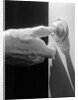 Hand Pressing a Door Bell by Anonymous