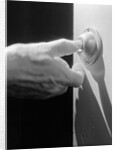 Hand Pressing a Door Bell by Anonymous