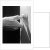 Hand Pressing a Door Bell by Anonymous