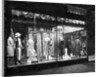Lighted Window Display of a Dress Shop by Anonymous