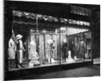 Lighted Window Display of a Dress Shop by Anonymous
