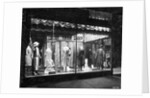 Lighted Window Display of a Dress Shop by Anonymous