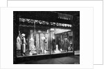 Lighted Window Display of a Dress Shop by Anonymous