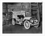 Electric Car at Charging Station by Anonymous
