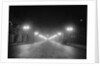 Lights Along a Foggy Street by Anonymous