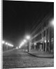 Street Lights Along a Cobblestone Street by Anonymous