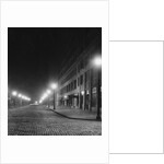 Street Lights Along a Cobblestone Street by Anonymous