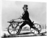 Man Riding Early Bicycle by Anonymous