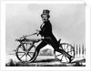 Man Riding Early Bicycle by Anonymous
