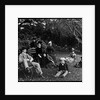 Group of People With Tennis Rackets by Anonymous