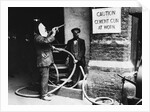 Construction Workers Spraying Cement on Roof with Concrete Gun by Anonymous