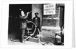 Construction Workers Spraying Cement on Roof with Concrete Gun by Anonymous