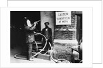Construction Workers Spraying Cement on Roof with Concrete Gun by Anonymous