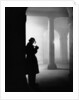 Silhouette of Man Lighting Pipe by Anonymous