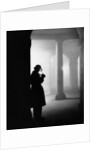Silhouette of Man Lighting Pipe by Anonymous