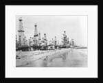 Oil Derricks on a Beach in California by Anonymous
