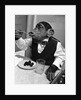 Chimpanzee Dining at a Table by Anonymous