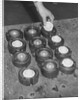 Golf Balls in Molds by Anonymous