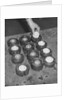 Golf Balls in Molds by Anonymous