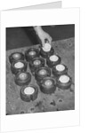 Golf Balls in Molds by Anonymous