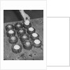 Golf Balls in Molds by Anonymous