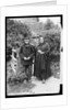 Elderly Couple Standing by Fence by Anonymous