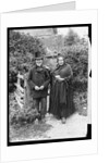 Elderly Couple Standing by Fence by Anonymous