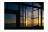Sunset Reflected on Windows by Anonymous