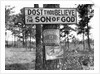 Signs along Highway by Anonymous