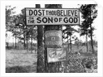 Signs along Highway by Anonymous