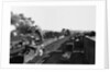 Engine Moving Through a Rail Yard by Anonymous